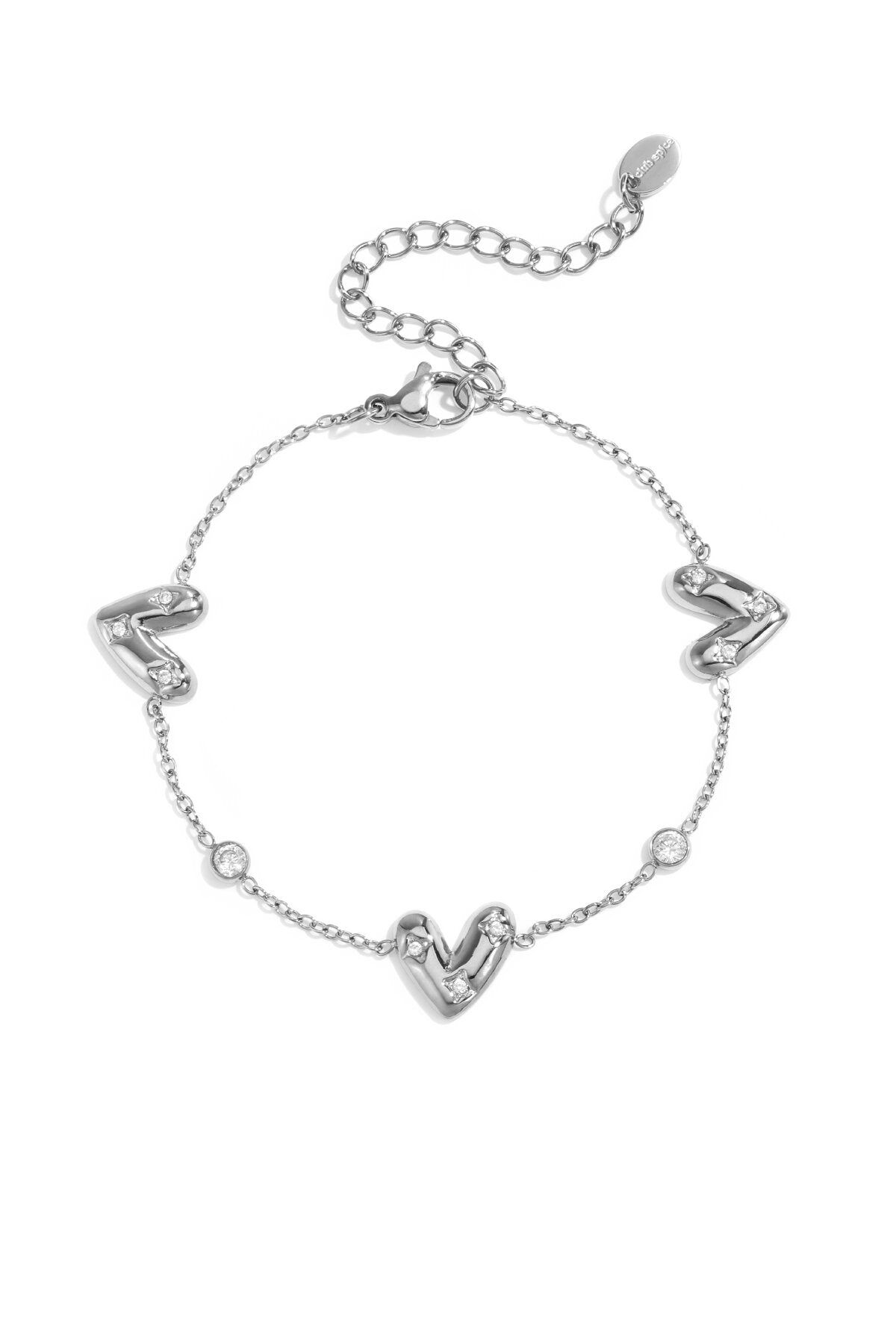 Bracelet with three set hearts and round cubic zirconia stones