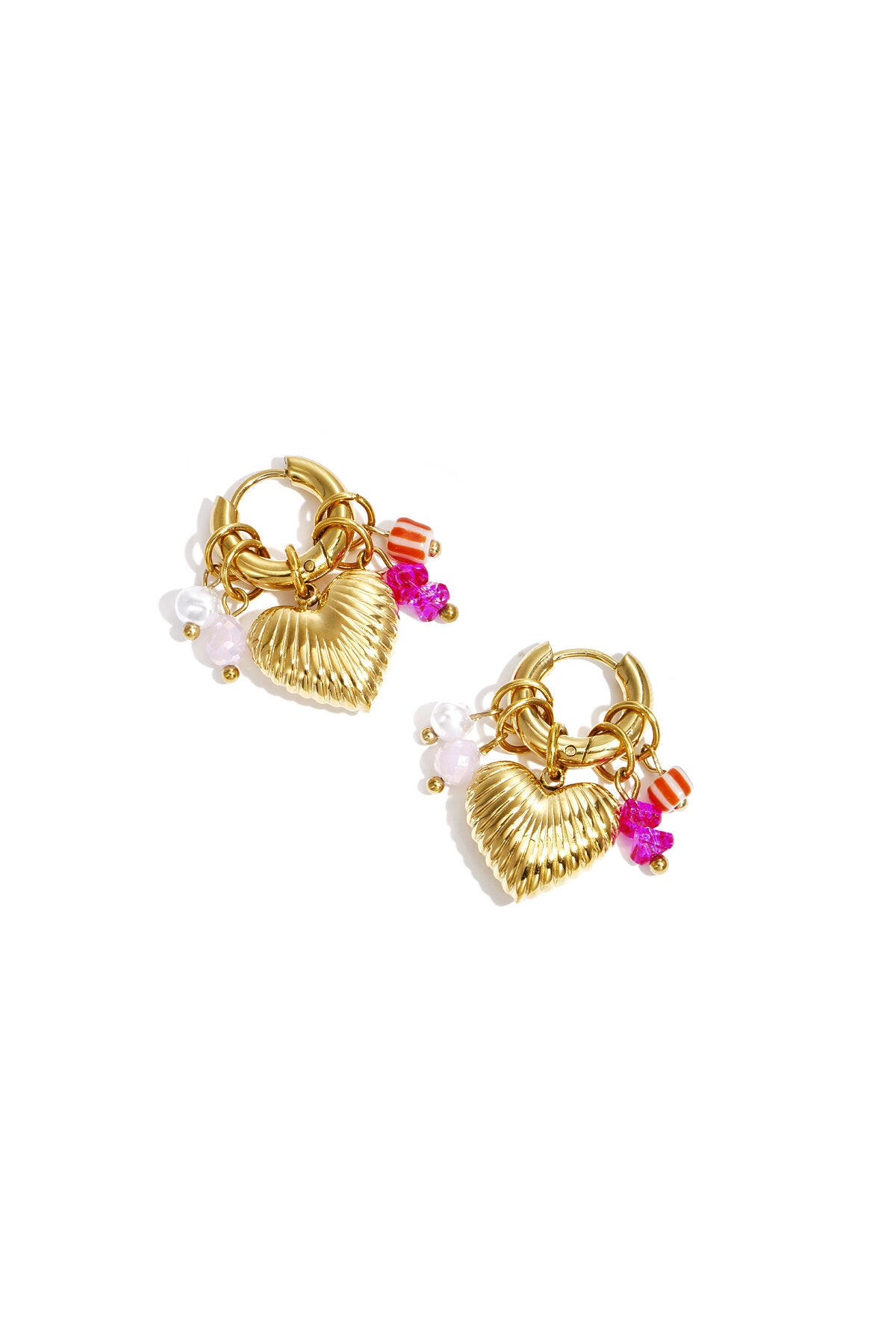 Small hoop earrings with dangling pearls, beads, and a heart