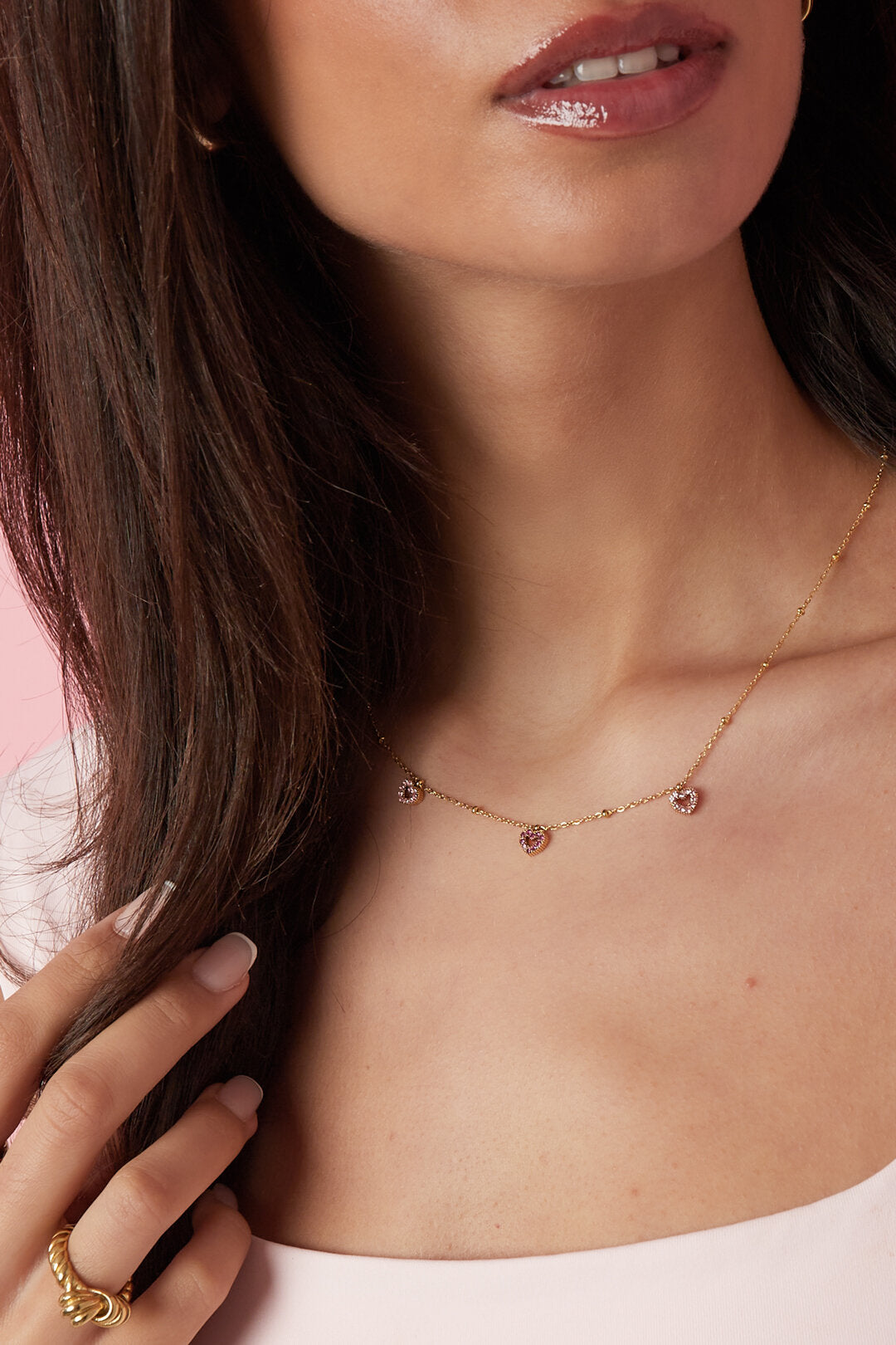 Necklace with pink stones in hearts