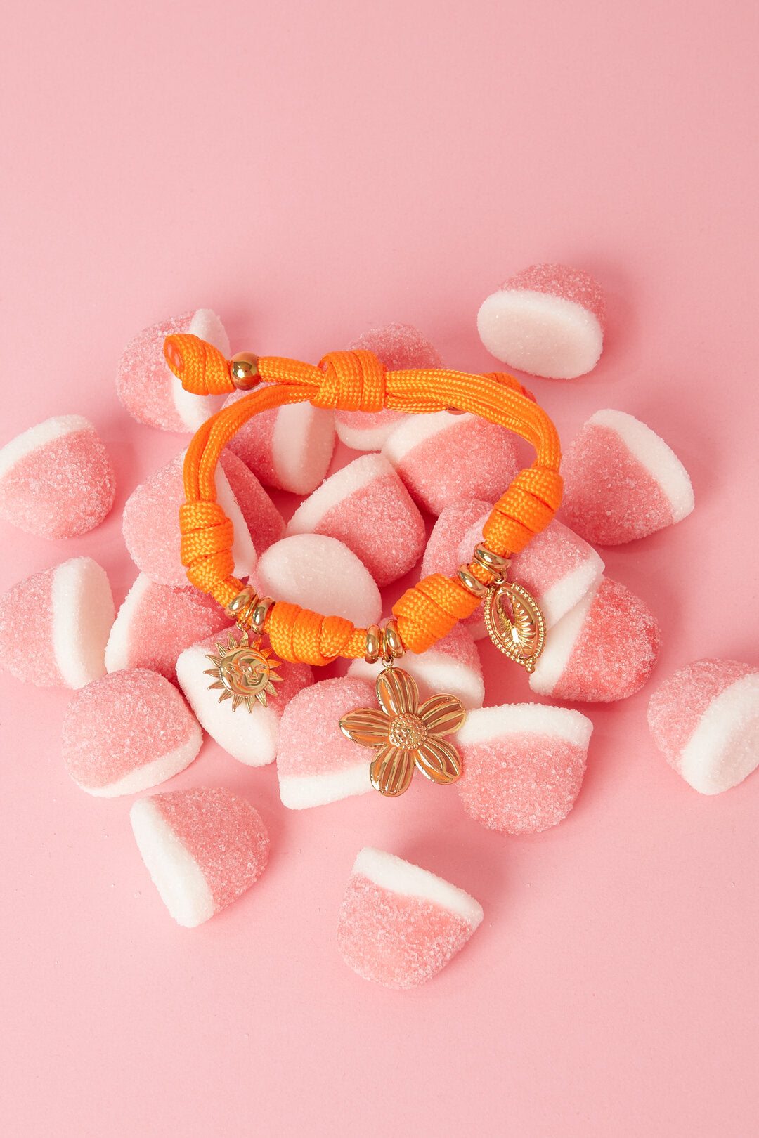 Rope bracelet with knots and various charms