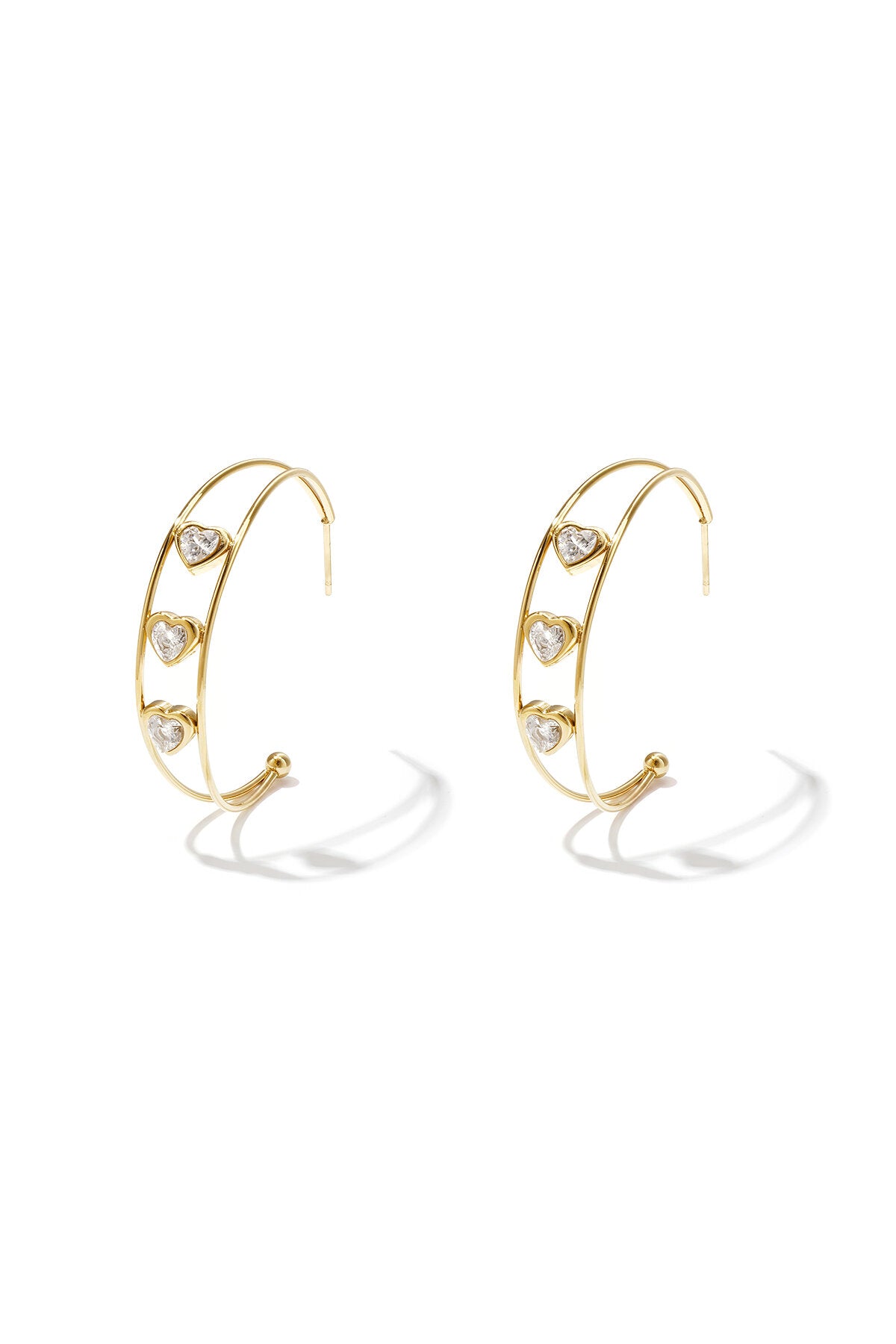 Double hoop earrings with hearts and cubic zirconia stones