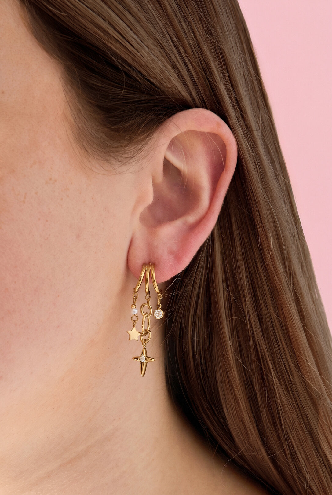 Triple earrings with star pendants