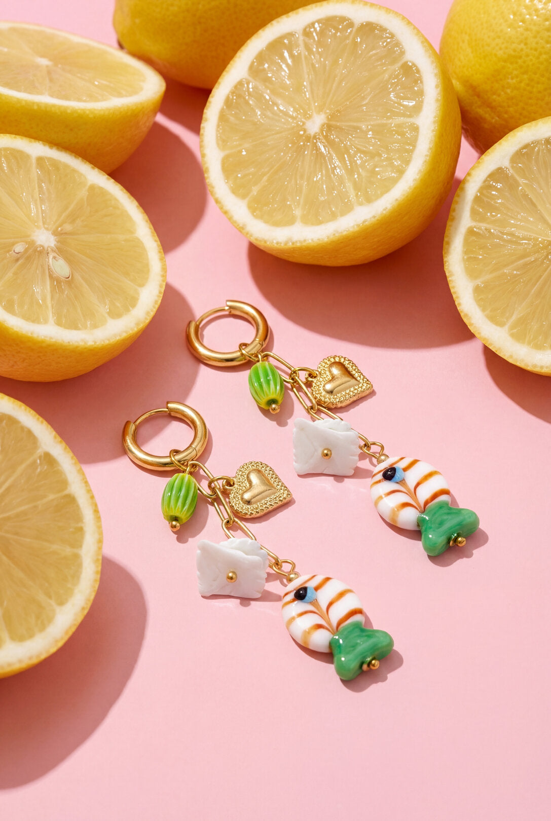 Earrings with chain and hanging charms