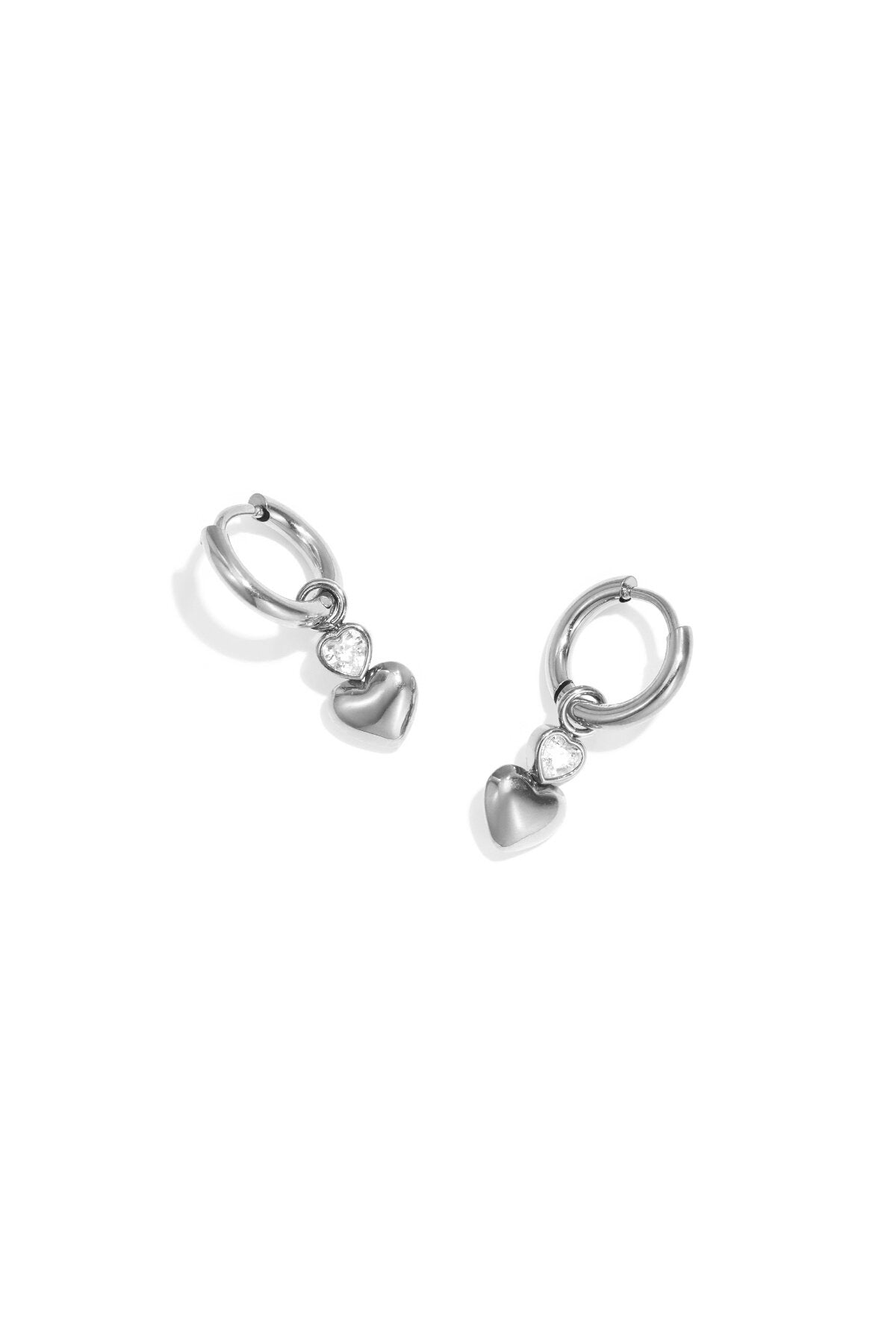 Earrings with dangling hearts and a heart-shaped stone