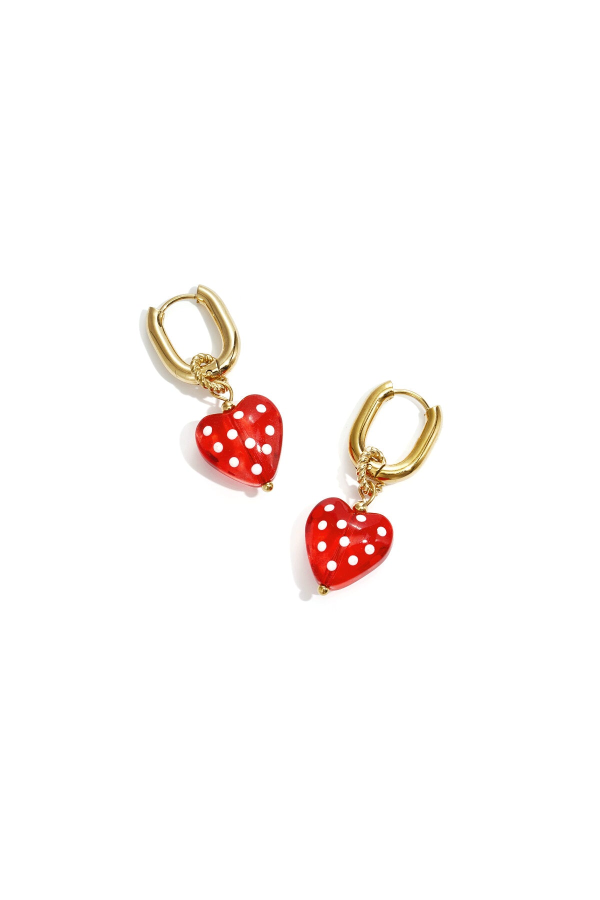 Earrings with dangling hearts with dots
