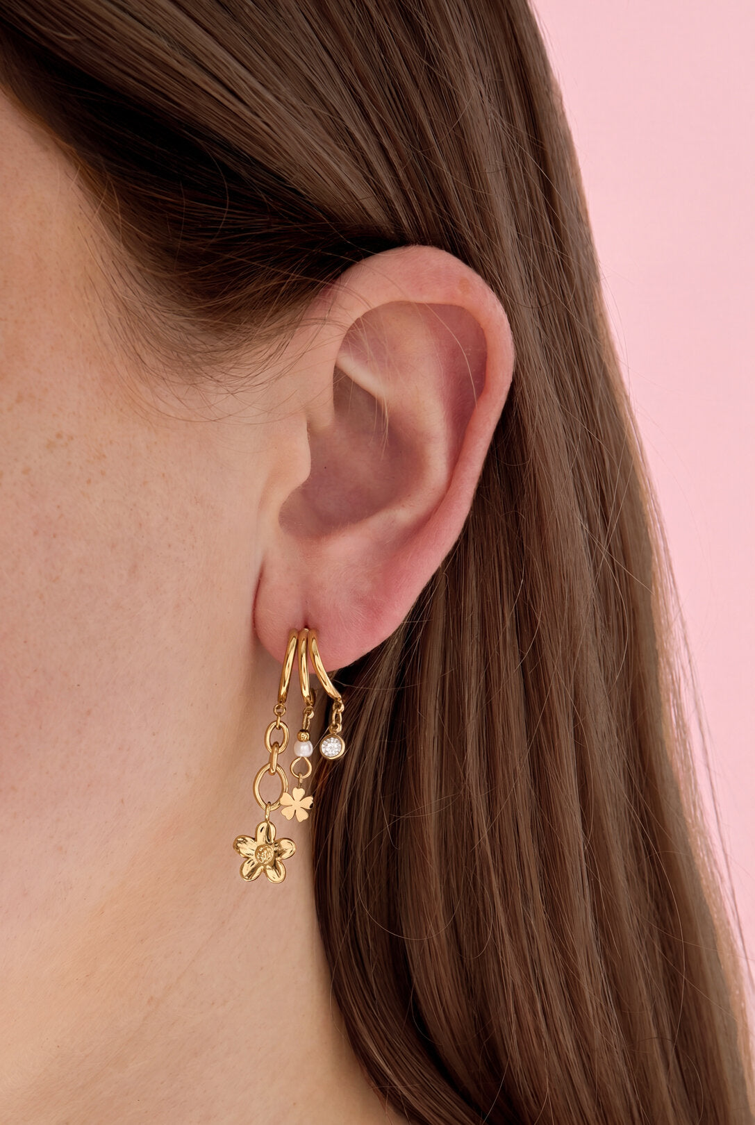 Triple earrings with floral pendants