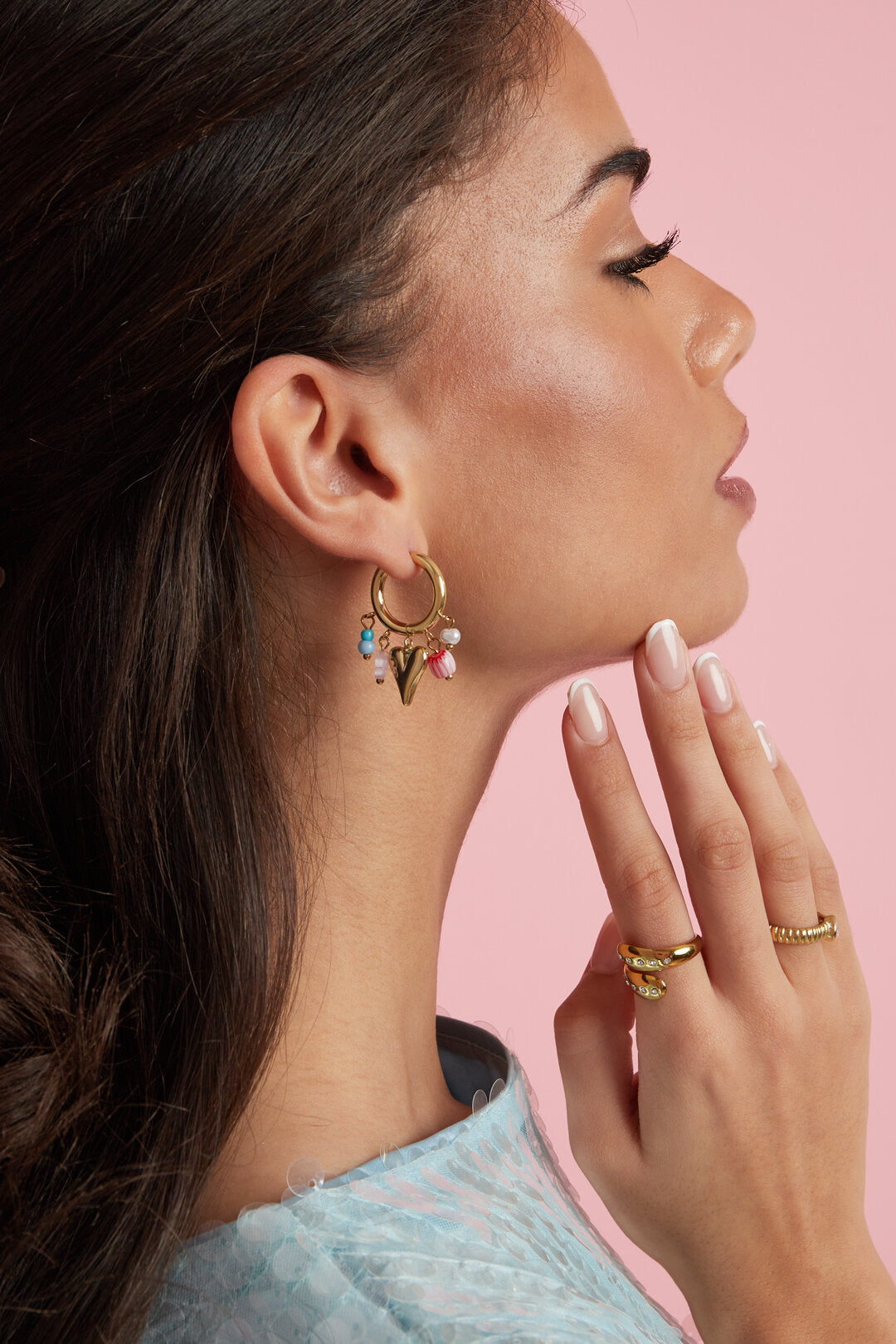 Earrings with dangling beads and heart