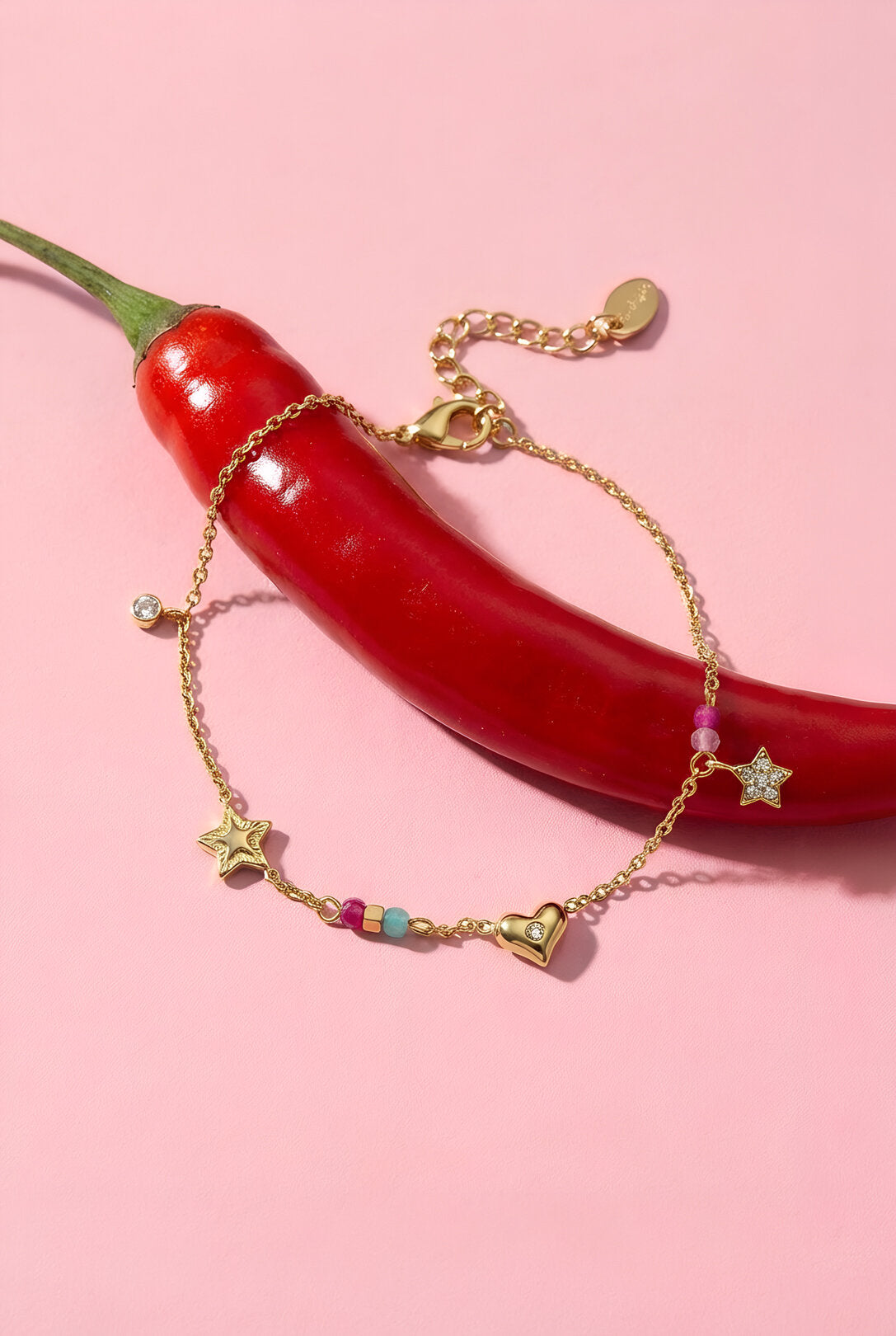 Charm bracelet with heart, star, stones and beads