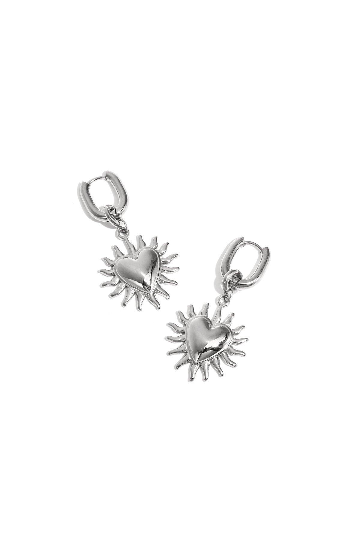 Earrings with dangling hearts and sunbeams